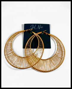 Oversized circle fan hoop in gold. Approximately 3.3" Length x 3.3" Width, clip back.