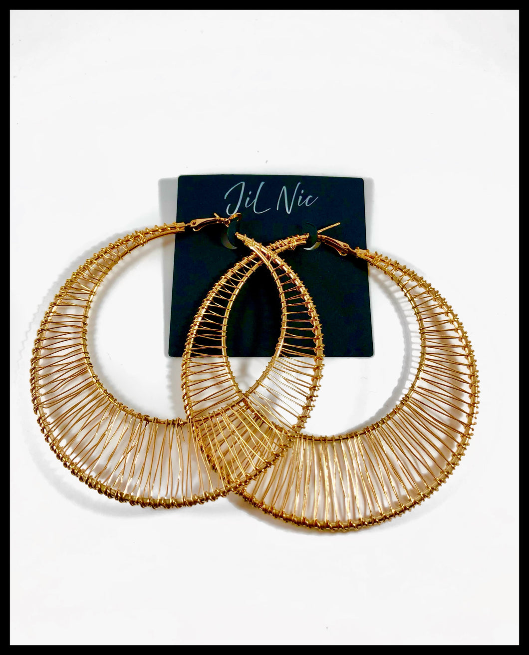 Oversized circle fan hoop in gold. Approximately 3.3