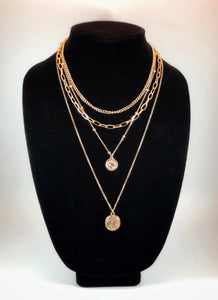 Four Layer Necklace with Plain Link Chain, Plain Chunky Chain, Studded Chain with Coin Charm and Delicate Link Chain with Coin Charm  Color: Gold Approx. 16-18-20-24" Length x 0.5-0.75" Pendant Clasp Closure 