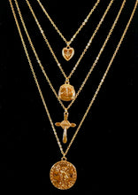 Load image into Gallery viewer, Magnified image of the set of four gold necklaces that can be layered or worn separately. Set includes Heart Charm with Rhinestone North Star Necklace, Compass Charm Necklace, Cross Charm Necklace, and Coin Charm Necklace.  Approximately 16-18-20-22&quot; Length, with Clasp Closure with 3&quot; Ball Extension.