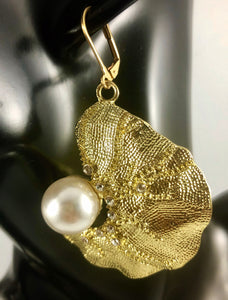 Enlarged picture of Biomorphic Gold Pearl with Rhinestone Details Dangle Earrings Color: Light Gold/White Approx. 2.5" Length x 2.0" Width  Lever Back