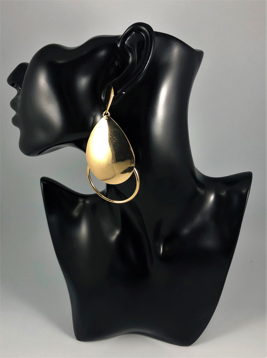 Gold double teardrop open drop earrings. Approximately 3.5